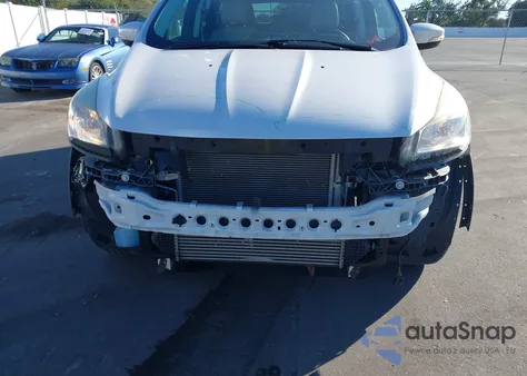 2014 Ford Escape Titanium z USA, uszkodzony, nr VIN 1FMCU0JX6EUC27833